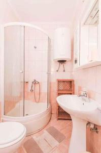 Ein Badezimmer in der Unterkunft Apartments in Mali Losinj 14985