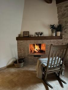 チビタベッキアにあるAntica Pietraのリビングルーム(ロッキングチェア付)