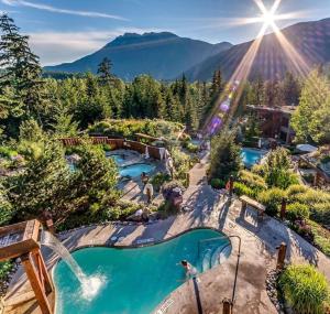 an image of a pool at a resort at Whistler Village 2BR, Sleeps 6, Air Con, Free Parking in Whistler