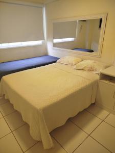 En eller flere senge i et værelse på Porto Real Resort Suites 1