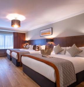 Krevet ili kreveti u jedinici u okviru objekta Glenroyal Hotel