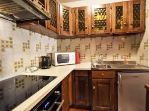 Kuchyň nebo kuchyňský kout v ubytování Apartment Casa Rossa by Interhome + 34 fotografií