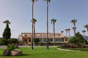 A garden outside Atlantica Thalassa Hotel