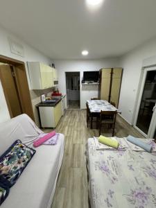 Apartment Perutović客房内的一张或多张床位