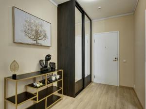 a room with a hallway with a door and a shelf at Narva-Jõesuu Medical Spa in Narva-Jõesuu