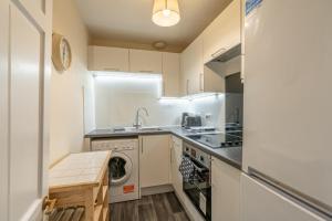 Η κουζίνα ή μικρή κουζίνα στο Apartment in excellent city centre location +9 φωτογραφίες