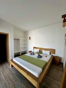 Postel nebo postele na pokoji v ubytování La Base Hotel