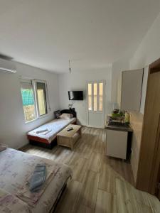 Apartment Perutović客房内的一张或多张床位