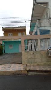 una casa al lado de una calle en my sweet place 4, en São Luís 3 fotos más