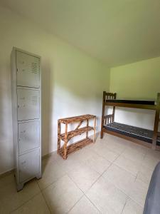 Hostel Ares do Mundo客房内的一张或多张床位