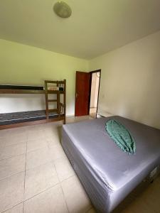 Hostel Ares do Mundo客房内的一张或多张床位