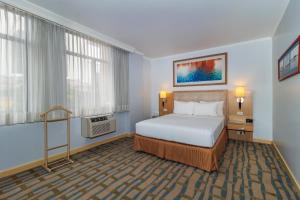 Postel nebo postele na pokoji v ubytování Grand Hotel Guayaquil, Ascend Hotel Collection