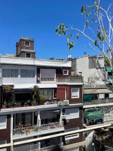 a building with balconies on the side of it at Arenales 2111 Recoleta in Buenos Aires
