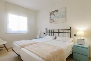 Posteľ alebo postele v izbe v ubytovaní Espectacular casa en la playa