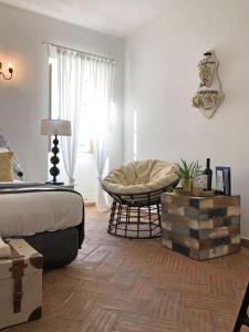 Ένα ή περισσότερα κρεβάτια σε δωμάτιο στο Chic Suite Sequa in Taviras Historical Centre