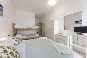 Postel nebo postele na pokoji v ubytování Hotel Le Ghiaie