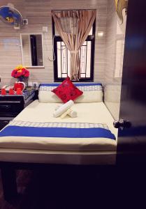 Llit o llits en una habitació de Dhillon Hotel -Guest House & Hostel