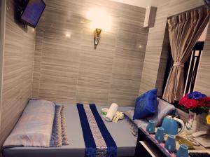 Llit o llits en una habitació de Dhillon Hotel -Guest House & Hostel