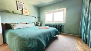 Postel nebo postele na pokoji v ubytování Bayerwaldresort + 27 fotografií