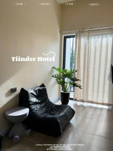 Posezení v ubytování Tiinder Hotel