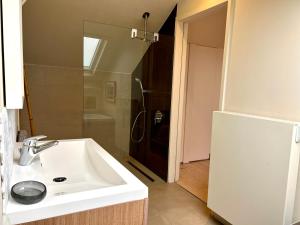 Koupelna v ubytování La Mer + 11 fotografií