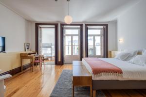 Ένα ή περισσότερα κρεβάτια σε δωμάτιο στο Alado Guesthouse