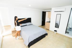 Postel nebo postele na pokoji v ubytování Lujoso Apartamento Céntrico 206