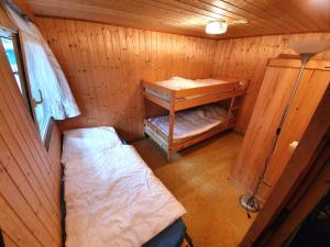 Postel nebo postele na pokoji v ubytování Feriensiedlung Schwalbennest