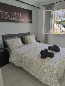 Ένα ή περισσότερα κρεβάτια σε δωμάτιο στο Homey ground floor flat in Denia