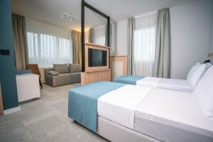 Letto o letti in una camera di Nordic Resort