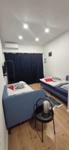 Posteľ alebo postele v izbe v ubytovaní X Rooms