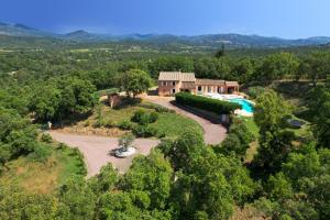an aerial view of a house with a swimming pool at Villa Olivia - Golfe de Saint-Tropez in Cogolin
