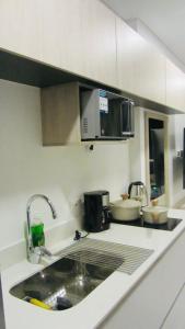 Kuchyň nebo kuchyňský kout v ubytování Porto Horizonte SUITE 904