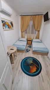 Posteľ alebo postele v izbe v ubytovaní All-in-a Good Space