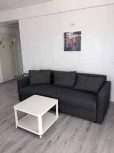 Гостиная зона в Excelsior Apartaments Mamaia Nord