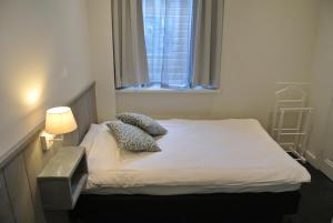 Krevet ili kreveti u jedinici u okviru objekta Hotel Doppenberg