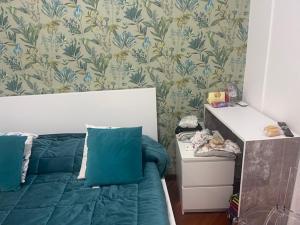 Postel nebo postele na pokoji v ubytování Appartamento int 1