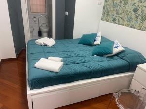 Postel nebo postele na pokoji v ubytování Appartamento int 1
