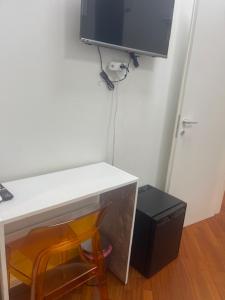 TV a/nebo společenská místnost v ubytování Appartamento int 1
