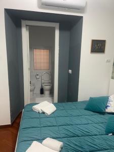 Postel nebo postele na pokoji v ubytování Appartamento int 1