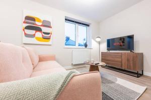 Televisyen dan/atau pusat hiburan di Luxurious 2 Bed Apartment Cardiff Central