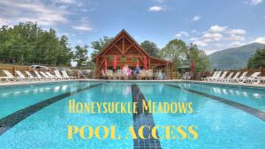 a swimming pool with a gazebo in the background at 3BR with mtn view and hot tub in Wears Valley! in Sevierville