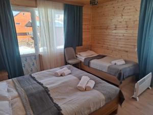 Letto o letti in una camera di Mountain house in Mestia
