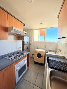 Kuchyň nebo kuchyňský kout v ubytování Amplio departamento en Andalue + 3 fotografie