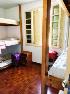 Cama ou camas em um quarto em Hostel Wanderlust