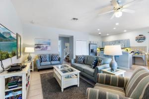 a living room with a couch and a table at Gorgeous Davenport 5 Bed Villa with Pool Hot Tub in Davenport