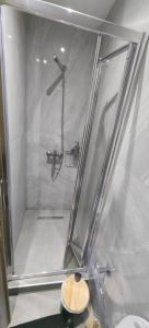 a shower stall in a bathroom with a toilet at Theasis 2 in Neos Marmaras +55 photos