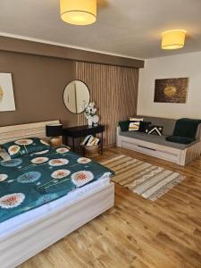 Postel nebo postele na pokoji v ubytování Apartmány Koněvova