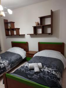 Postel nebo postele na pokoji v ubytování Rea's flat