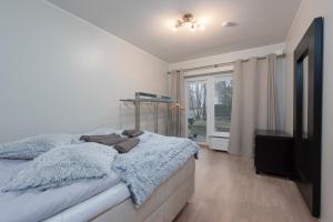 Postelja oz. postelje v sobi nastanitve Padriku Apartment with a balcony,near to central,Self Check In 24 7,FREE Parking